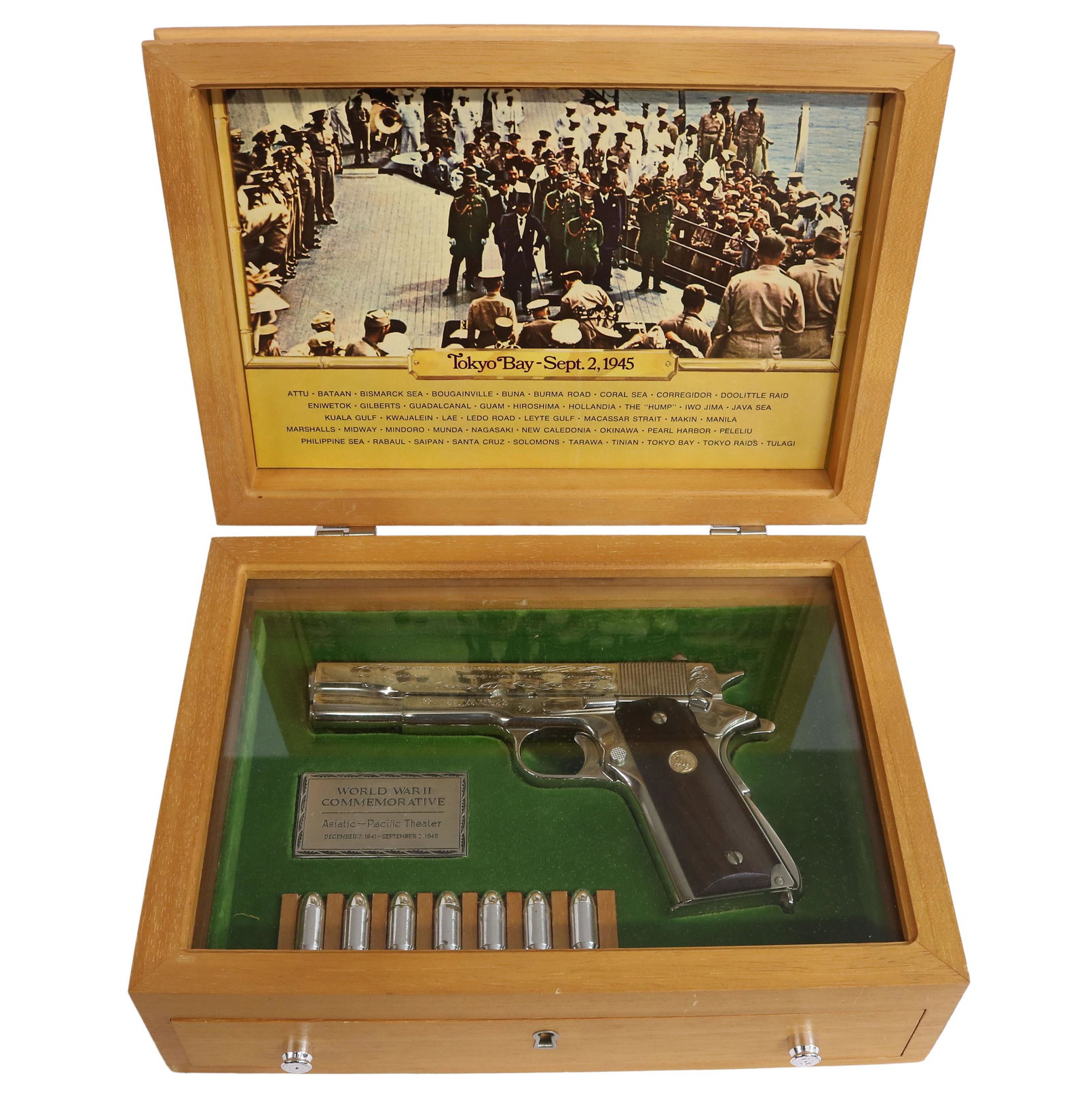 COLT 1911 WWII PACIFIC THEATER COMMEMORATIVE .45: Colt Model 1911 pistol, engraved "World War Commemorative Pacific Theater of Operations" and geographic areas including Pearl Harbor, Coral Sea, Iowa Jima, Tokoyo and others, .45 Auto caliber, 5" barr