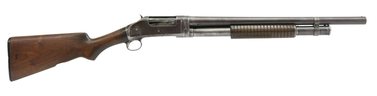 WINCHESTER M1897 PUMP SHOTGUN, 12 GAUGE: Winchester Model 1897 shotgun, slide action, 12 gauge, 20" full choke barrel, tubular magazine, hardwood stock, owner carved letter on stock, SN 5239XX *REQUIRES FFL TRANSFER* Start Price: $150.00