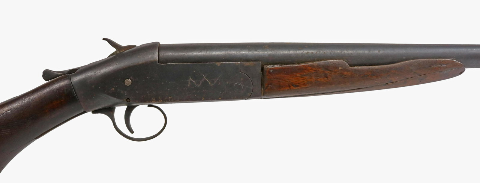 'LONG TOM' 16 GAUGE SHOTGUN: "Long Tom" single shot 16 gauge shotgun, no maker name but possibly by Harrington and Richardson, barrel marked "Genuine Armory Steel" and "Choke Bored," 32.75" barrel, forestock damaged, hammer will 