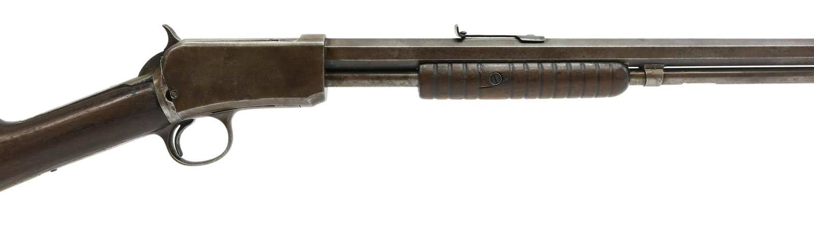 WINCHESTER M1890 SLIDE ACTION .22S RIFLE: Winchester Model 1890 slide action take down rifle, .22S caliber, 24" octagonal barrel, tubular magazine, hardwood stock, guard tang SN 7047XX, receiver underside marked 2325XX *REQUIRES FFL TRANSFER*