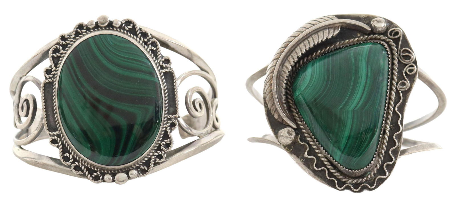 (2) SOUTHWEST SILVER & MALACHITE CUFF BRACELETS: (lot of 2) Southwest silver and malachite cuff bracelets, including: (1) having open scrollwork cuff, central malachite oval within a bead and wire surround, stamped handmade sterling, plaque: approx