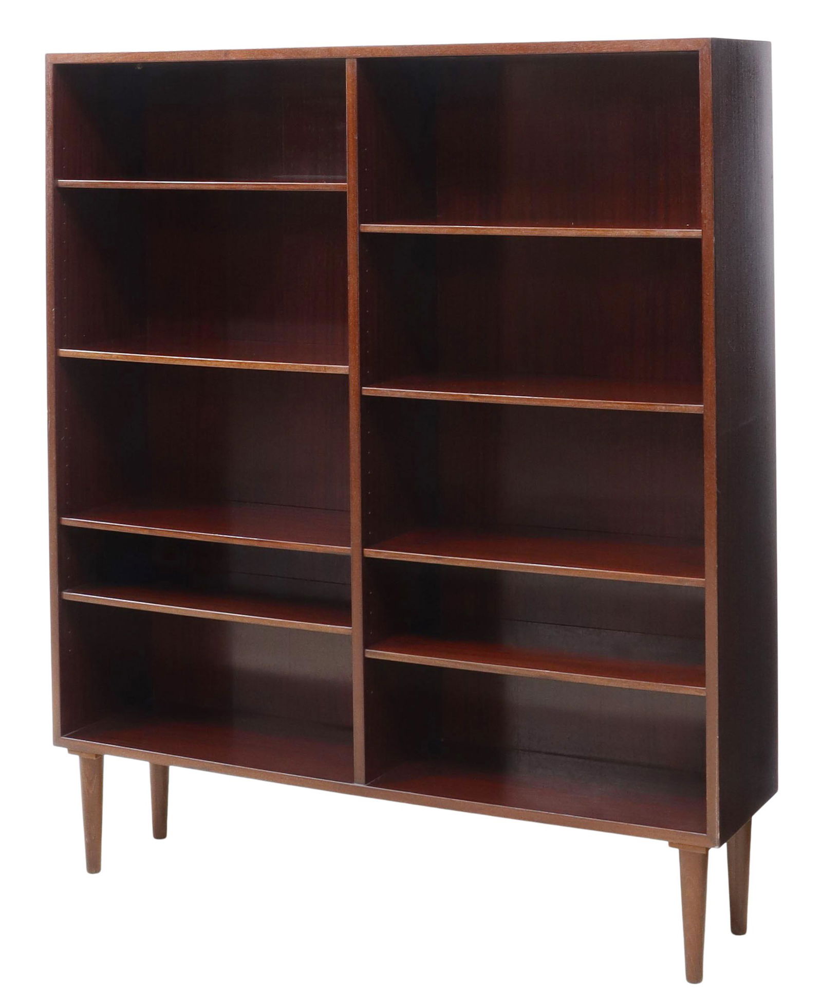 DANISH OMANN JUN MID-CENTURY ROSEWOOD BOOKCASE: Danish mid-century modern rosewood bookcase, manufactured by Omann Jun, c.1960s, adjustable-height shelves, rising on tapered cylindrical legs, approx 55.75"h, 47.25"w, 11.5"d Start Price: $200.00