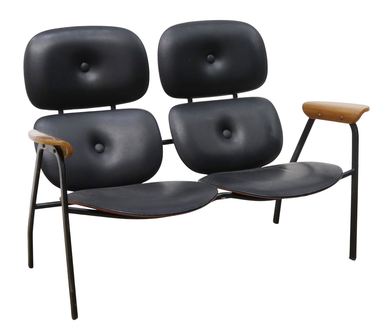 ITALIAN MID-CENTURY MODERN JOINED TWO SEATER: Italian mid-century modern joined two seater, in the manner of Gae Aulenti (Italian, 1927-2012), c.1960s, black leatherette upholstery with red trim, laminated bentwood arms, rising on stretcher-joine