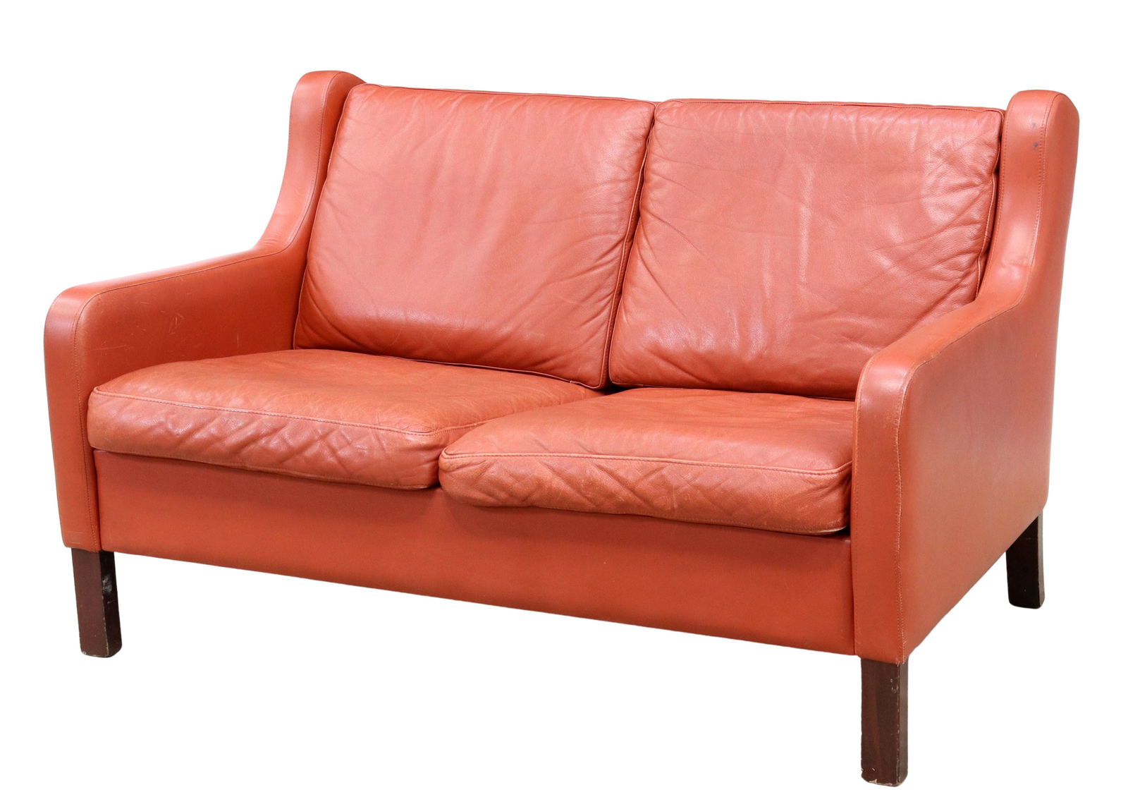 DANISH MODERN MOGENS HANSEN LEATHER TWO-SEAT SOFA: Danish mid-century modern leather two-seat sofa, Mogens Hansen, c.1960s-1970s, loose back and seat cushions, rising on block legs, approx 29.5"h, 48.25"w, 32"d, seat height: 16"h Start Price: $200.00