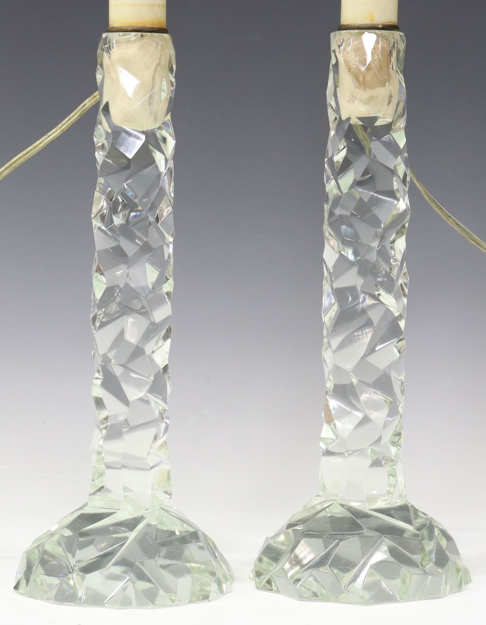 (2) ART DECO GLASS SINGLE-LIGHT TABLE LAMPS: (pair) Art Deco glass table lamps, single light over faux candle, glass base with rhombic pattern, (one) with chips to foot, approx 17.5"h, 5.25"diam; 9lbs total Start Price: $80.00