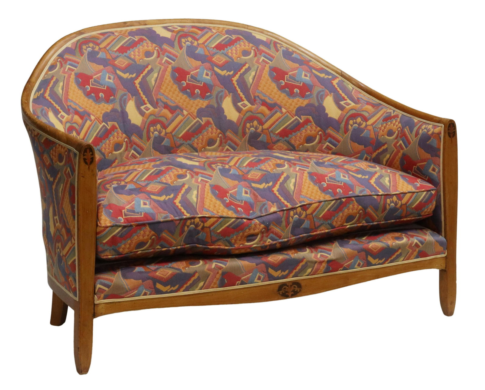 FRENCH ART DECO WALNUT UPHOLSTERED CURVED SOFA: French Art Deco sofa, c.1930s, having walnut frame, with foliate marquetry inlay and parquetry banding, geometric patterned upholstery fixed with woven trim, loose bench seat cushion, rising on block 