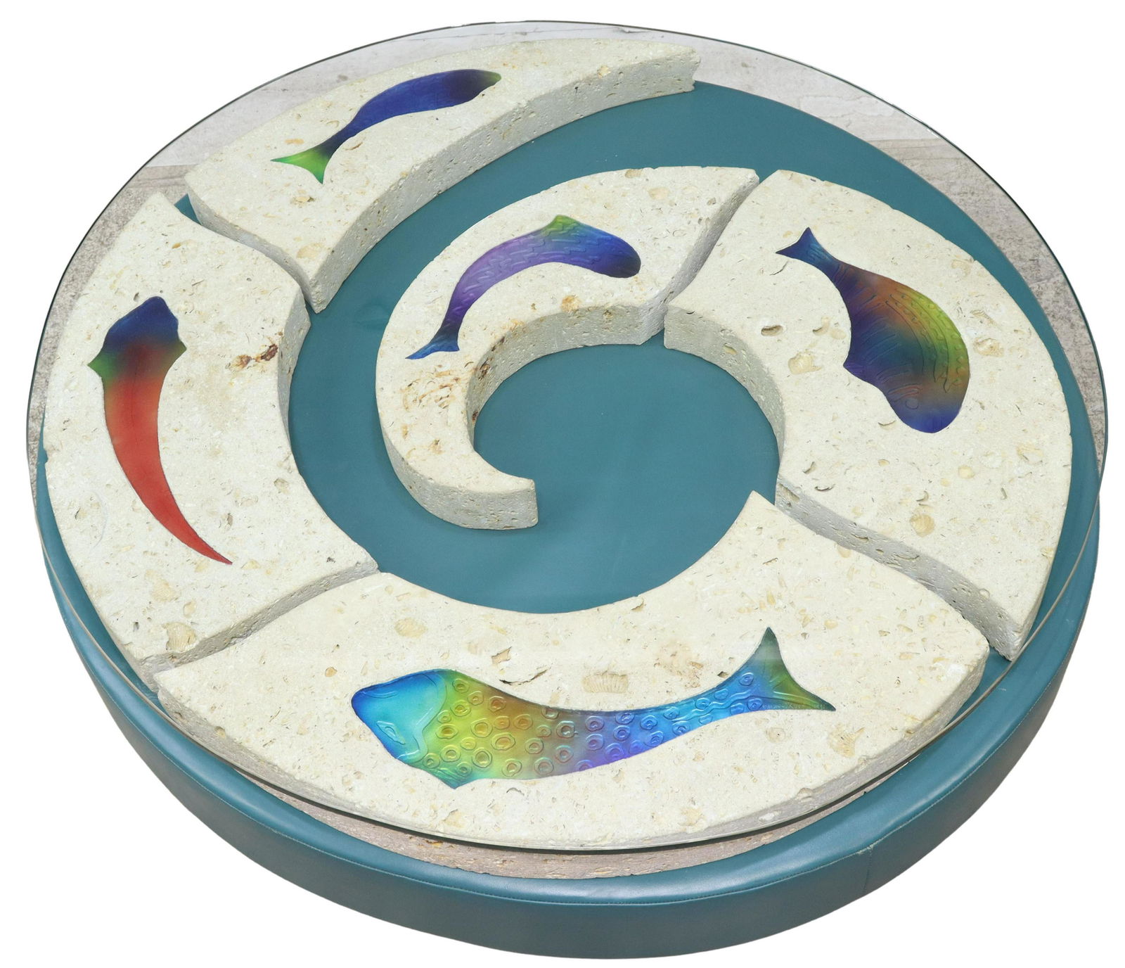 DAMIAN PRIOUR (1949-2011) GLASS & LIMESTONE TABLE: Modern circular coffee table, signed Damian Priour (Austin, Texas, 1949-2011), dated 1991, having hardwood and upholstered base, five Cordova limestone pieces with multicolor glass fish, fitting toget