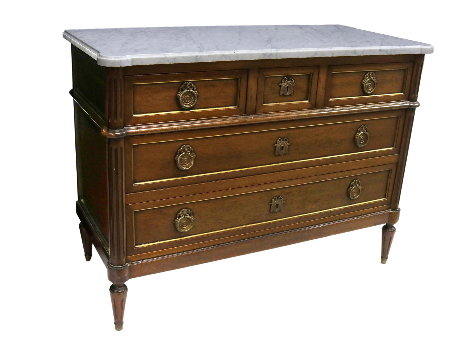 FRENCH LOUIS XVI STYLE MARBLE-TOP MAHOGANY COMMODE: French Louis XVI style marble-top mahogany commode, early 20th c., shaped marble top, over case fitted with five drawers, flanked by fluted corner posts, rising on tapered legs, ending in metal-capped