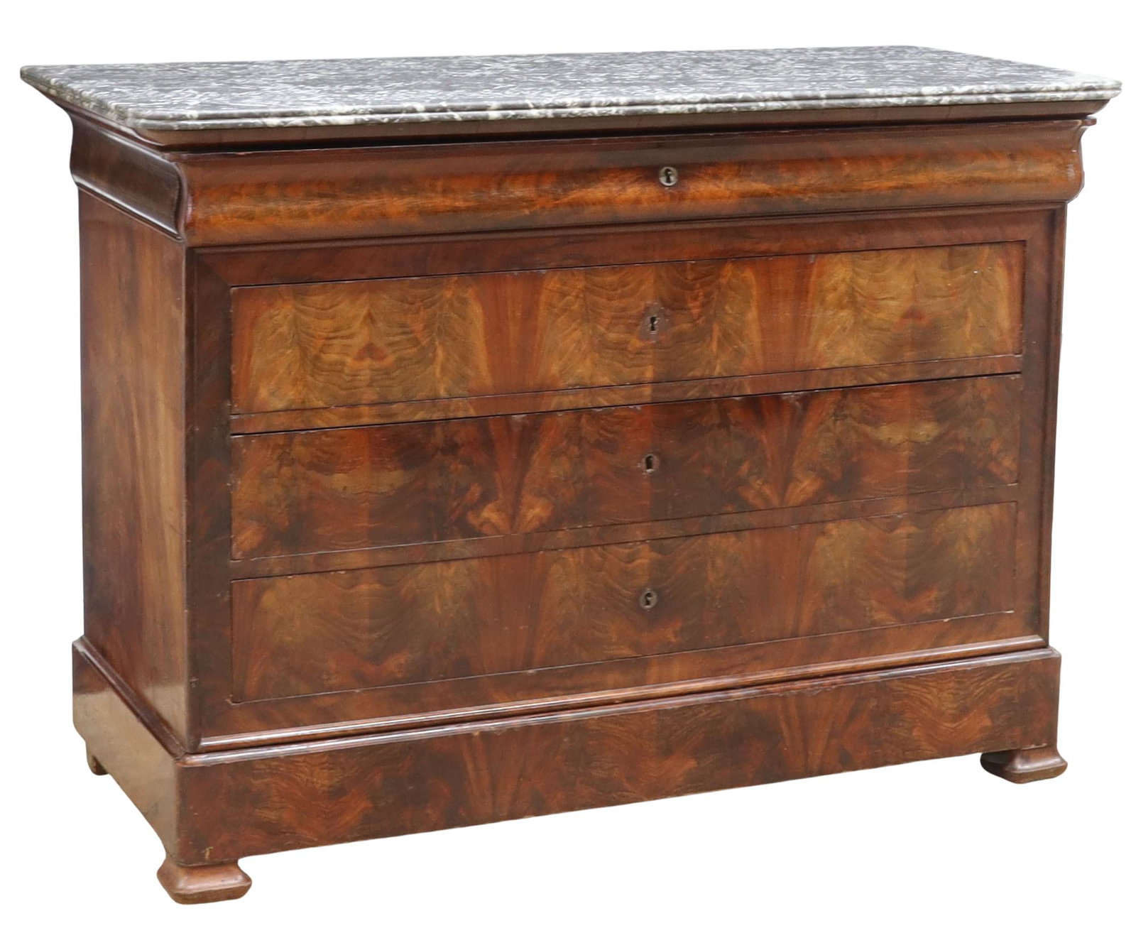 FRENCH LOUIS PHILIPPE MARBLE-TOP MAHOGANY COMMODE: French Louis Philippe period marble-top mahogany commode, mid 19th c., top ogee drawer with sectioned interior, four additional drawers below, lowest drawer concealed in base, rising on molded bracket