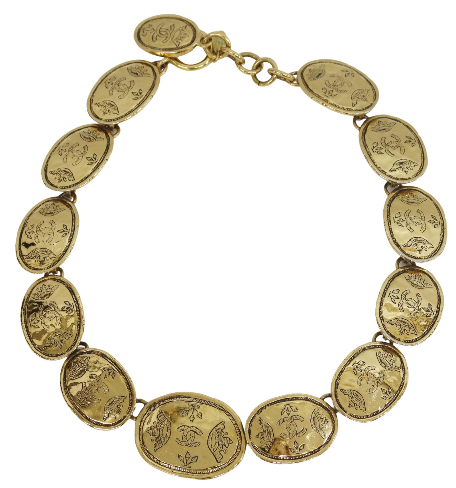 VINTAGE CHANEL REGAL CROWN LOGO CHAIN CHOKER: Vintage Chanel gold-tone metal regal crown logo coin medallion choker necklace, c.1980s, linked chain, with oval medallions bearing CC logo and etched crown motif, with clasp closure, accompanied by n