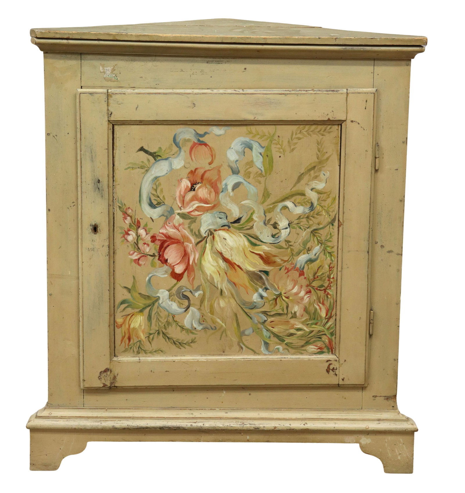 ITALIAN PAINT DECORATED PINE CORNER CABINET: Italian paint decorated pine corner cabinet, early 20th c., single door polychrome painted with floral spray, interior shelves, rising on bracket feet, approx 44.25"h, 38"w, 20.25"d Start Price: $100.