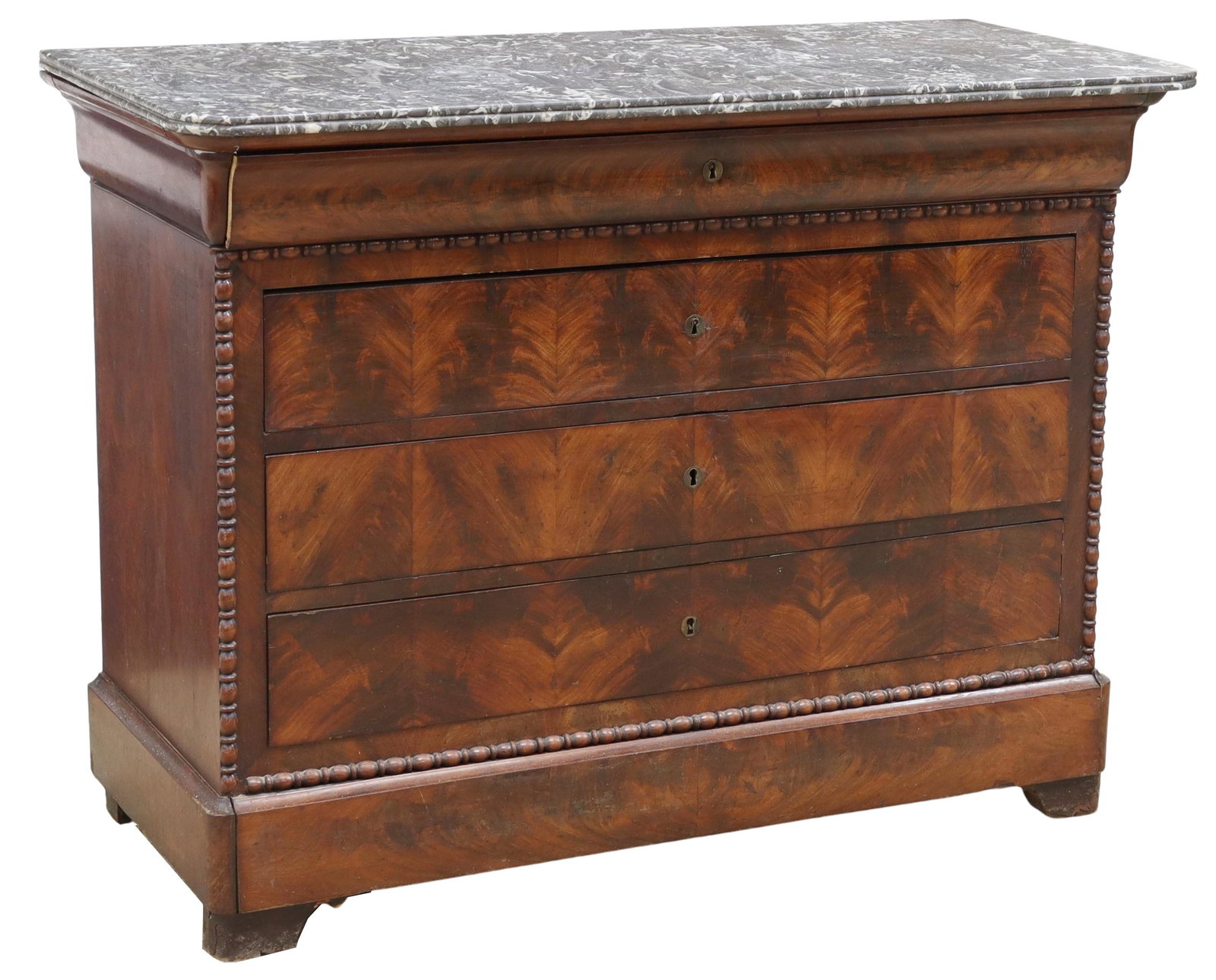 FRENCH MARBLE-TOP MAHOGANY FIVE-DRAWER COMMODE: French marble-top mahogany commode, 19th c., top ogee drawer, four additional drawers below, lowest drawer concealed in base, all accented with turned trim, rising on bracket feet, separation at side