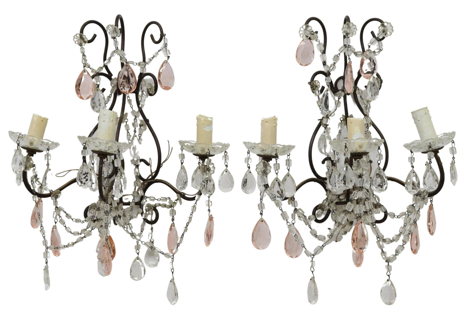 (2) ITALIAN METAL & CRYSTAL 3-LIGHT WALL SCONCES: (pair) Italian metal and crystal three-light wall sconces, 20th c., having patinated wire scroll frame hung with pink and colorless prisms, supporting three pressed glass bobeches ending in faux candl