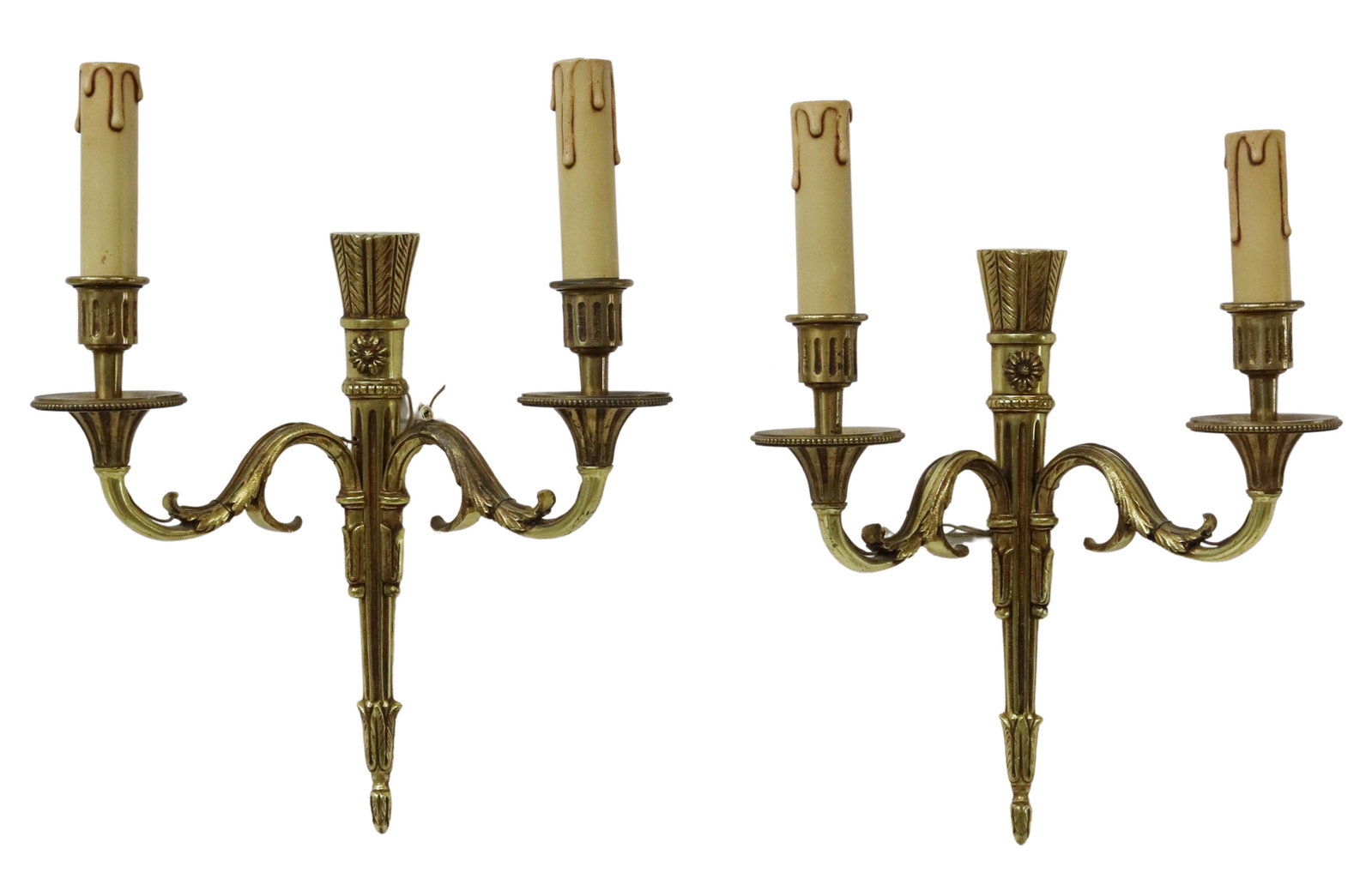 (2) FRENCH LOUIS XVI STYLE BRONZE 2-LIGHT SCONCES: (lot of 2) French Louis XVI style bronze two-light wall sconces, early 20th c., fluted wall plate modeled as a quiver of arrows, supporting two foliate scroll arms, each ending in bobeche and faux can