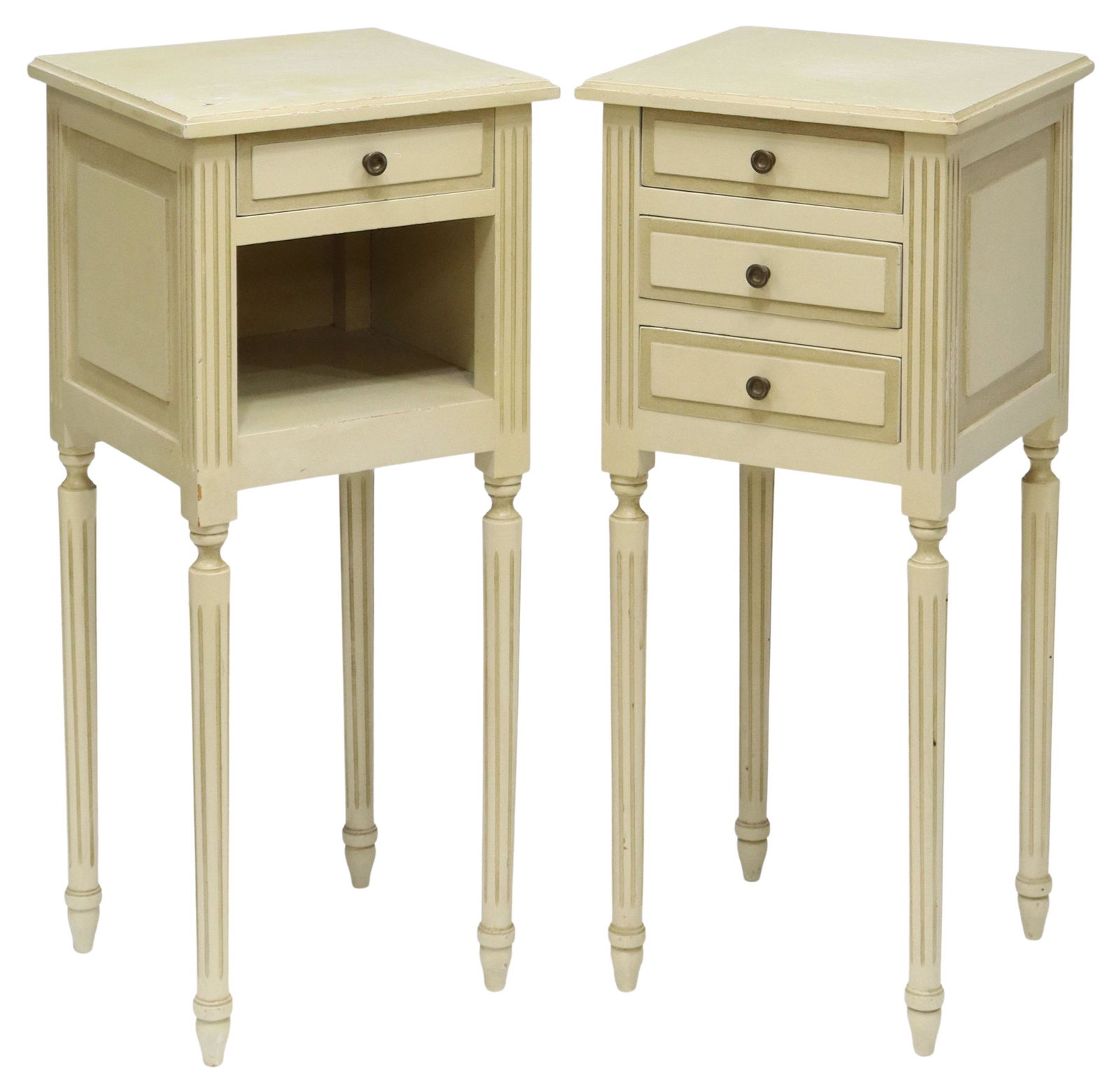 (2) FRENCH LOUIS XVI STYLE PAINTED NIGHTSTANDS: (pair) French Louis XVI style painted nightstands, 20th c., rectangular top, (one) fitted with three drawers, (one) with single drawer over open niche, flanked by fluted corner posts, rising on fluted