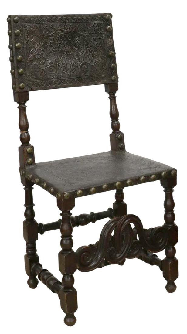 BAROQUE STYLE TOOLED LEATHER SIDE CHAIR: Baroque style leather side chair, 19th c., walnut frame, having highly tooled leather backrest and seat depicting foliate and figural motifs, large nailhead trim, scrolled front stretcher, on stretche