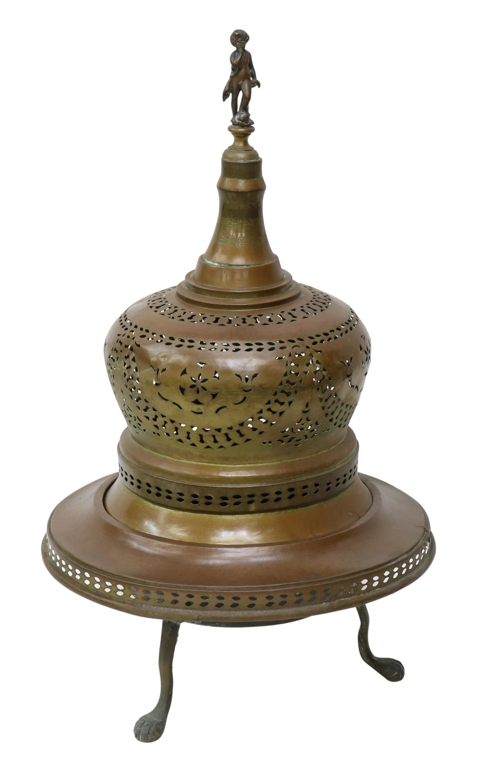 MIDDLE EASTERN BRASS BRAZIER, 19THC: Middle Eastern brass brazier, having bell shaped dome lid topped with figural putti finial, seated above hammed copper basin centered in flared rim, richly worked in pierced design throughout, rising 