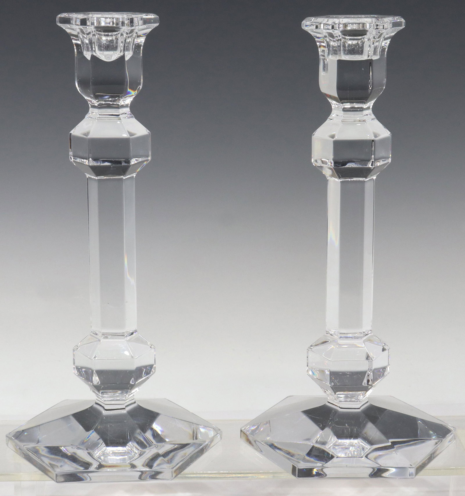 (2) VAL ST LAMBERT 'GARDENIA' CRYSTAL CANDLESTICKS: (pair) Belgian crystal candlesticks, Val Saint Lambert, in the "Gardenia" pattern, acid-etched mark underfoot, (one) with small chip to edge of foot, approx 9.5"h, 4.75"w; 3.5lbs total Start Price: $4