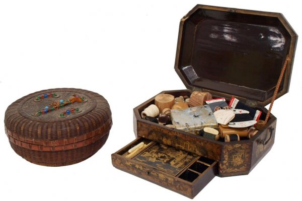 CHINESE EXPORT GILT LACQUERED SEWING BOX & BASKET: (lot of 2) Chinese export gilt decorated lacquered sewing box with contents, painted reserves featuring figural scenes and elaborate raised enameling, single drawer below opening to reveal a fitted in