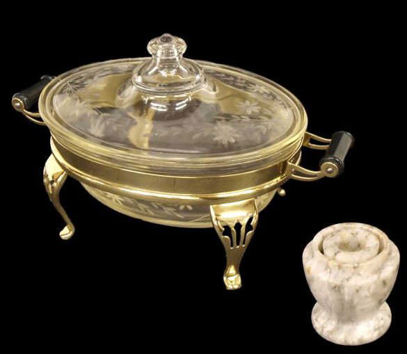 ETCHED GLASS SERVICE DISH ON GILT METAL STAND: (lot of 2) Mixed lot comprising: (1) etched Pyrex service dish and lid, floral motif, gold tone stand with pierced legs, 8.5"h, 13"l; (1) unusual alabaster candleholder, white with black and gray vein