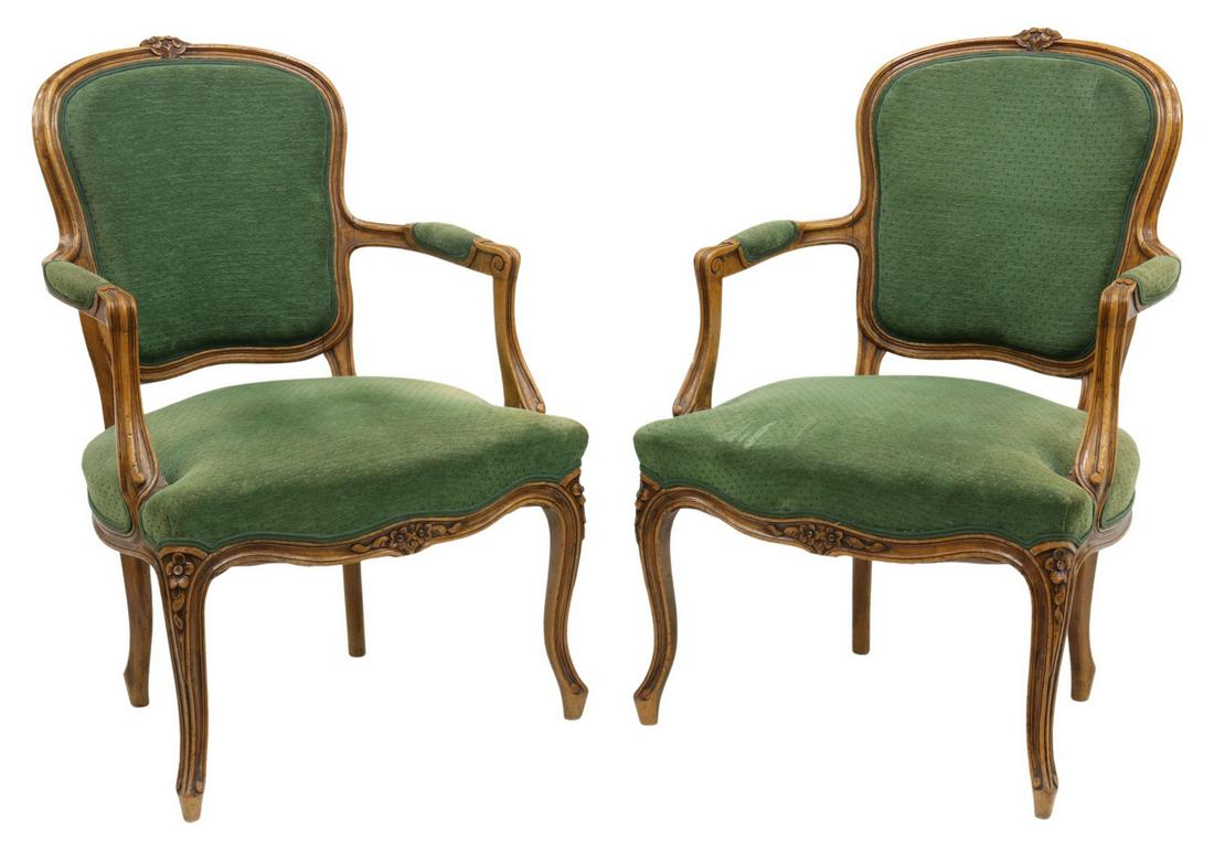 (2) FRENCH LOUIS XV STYLE UPHOLSTERED FAUTEUILS: (pair) French Louis XV style armchairs, early 20th c., curved beechwood frame with carved foliate accents, green upholstery to back, arms, and seat cushion, rising on cabriole legs, approx 34"h, 23.5"