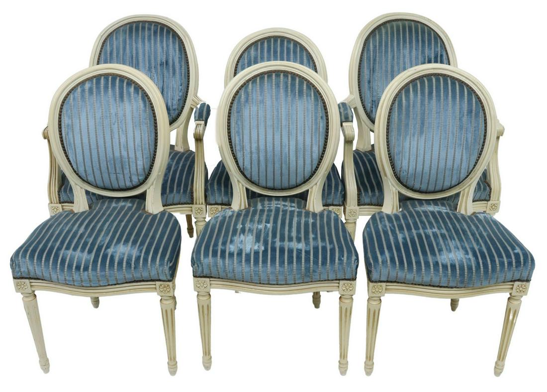 (6) FRENCH LOUIS XVI STYLE MEDALLION-BACK CHAIRS: (lot of 6) French Louis XVI style dining chairs, early 20th c., parcel gilt and painted frame, oval-shaped back, in striped velvet upholstery, with nailhead trim, carved foliate medallions, rising on 