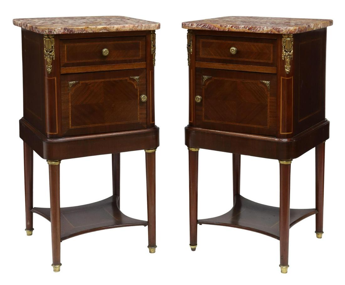 (2) LOUIS XVI STYLE ONYX-TOP MAHOGANY NIGHTSTANDS: (pair) French Louis XVI style onyx-top bedside cabinets, early 20th c., mahogany case with gilt metal mounts, a single drawer over cabinet door, opening to interior porcelain liner, rising on tapered 