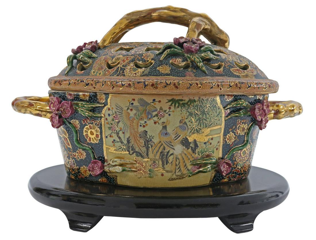 SATSUMA STYLE PARCEL GILT PORCELAIN TUREEN: Satsuma style parcel-gilt porcelain covered tureen, with raised enamel, pierced lid, applied floral accents and handles, reserves featuring birds and foliate motifs, with butterfly and floral accents 