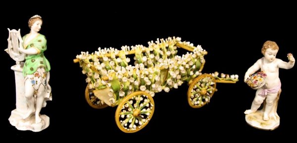 ANTIQUE MEISSEN PORCELAIN PUTTI & FLORAL CART: (lot of 3) Continental porcelain pieces comprising: (1) Meissen figure, mid 19th/early 20th c., modeled as a putti presenting a flower and holding a parcel gilt flower basket, marked with blue crossed