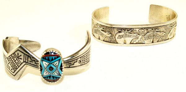 SANTO DOMINGO STERLING SILVER BRACELETS, TENORIO: (lot of 2) Roderick Tenorio of Santo Domingo, New Mexico, RMT sterling silver bracelets: (1) cuff, intricately designed in a bear motif; (1) of unusual form with a medallion set with turquoise, mother