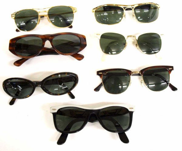 COLLECTION OF VINTAGE RAY BAN SUNGLASSES: (lot of 7) Vintage and later Ray Ban sunglasses varied styles with 'Celebrities', 'Wayfarer', etc., in Ray Ban cases, 1.25lbs