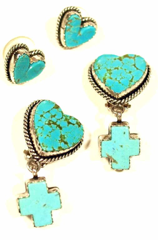 JEWELRY: JOAN SLIFKA STERLING & TURQUOISE EARRINGS: (2 pair) Joan Slifka Designs sterling silver earrings set with turquoise: (1pr) for pierced ears of heart form; (1pr) clip on featuring a large heart with cross form dangle; 30 grams tw