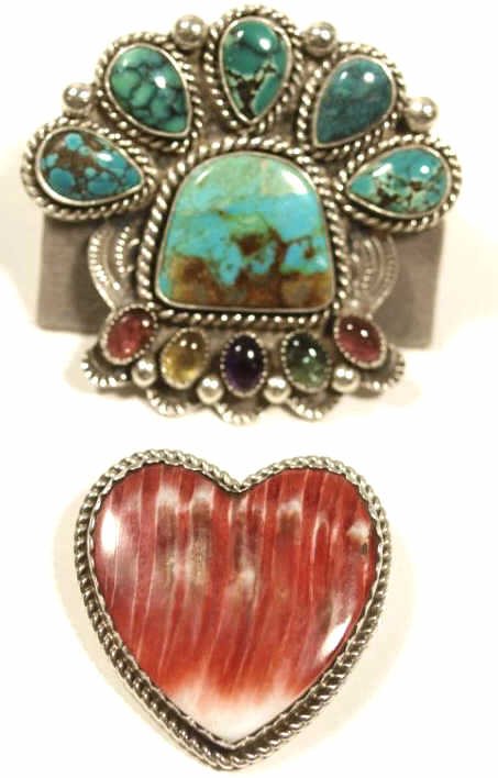 JEWELRY: JOAN SLIFKA STERLING & TURQUOISE BROOCHES: (lot of 2) Joan Slifka Designs sterling silver brooches, each doubling as a pendant, including: (1) of heart form set with spiny oyster shell, unsigned, marked sterling; (1) elaborate piece set with t