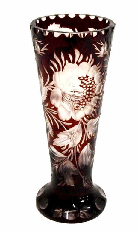 FINE BOHEMIAN RUBY RED FLORAL CUT TO CLEAR VASE: Fine Bohemian ruby cut to clear glass vase, mid/late 19th. c., elaborate floral and foliate motif on a pedestal base, 7.75"h, 3"w, 1lb