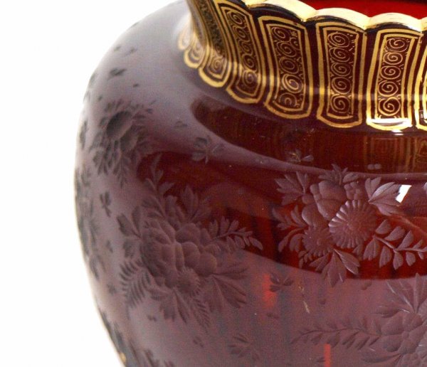 ANTIQUE BOHEMIAN ETCHED & GILDED RUBY RED VASE: Exceptional Bohemian glass vase of squat form,19th c., intricately etched floral motifs and fluting enhanced with parcel gilt patterns, some wear to gilding consistent with age, 5"h, 4"w, 2lbs