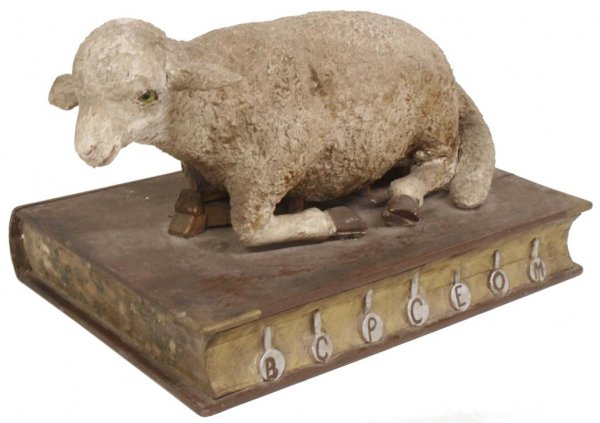 LARGE ANTIQUE RELIGOUS STATUE, CORDER MISTICO: Large religious statue, 'Cordero Mistico' or The Mystic Lamb of Seven Seals, Mexico, 18th c., described in the Book of Revelation, the lamb with glass eyes resting on a parcel gilt, wooden base formed