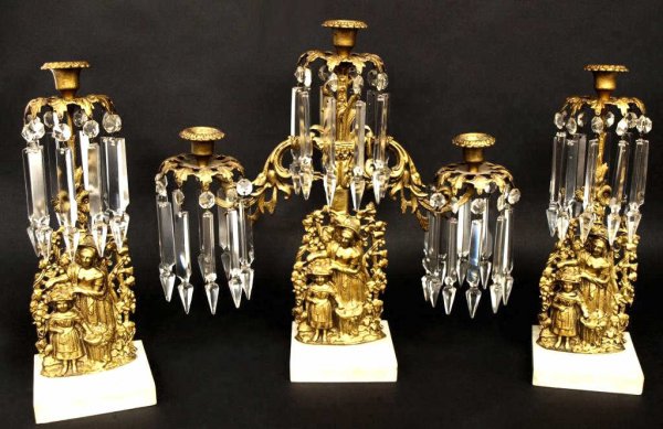 VICTORIAN GILT METAL, MARBLE & PRISM GIRANDOLE SET: (set of 3) Victorian gilt metal girandole set, each standard with figural scene of mother and child, marble base, comprising (1) central 3-arm candelabra and (2) single-light candelabra hung with larg
