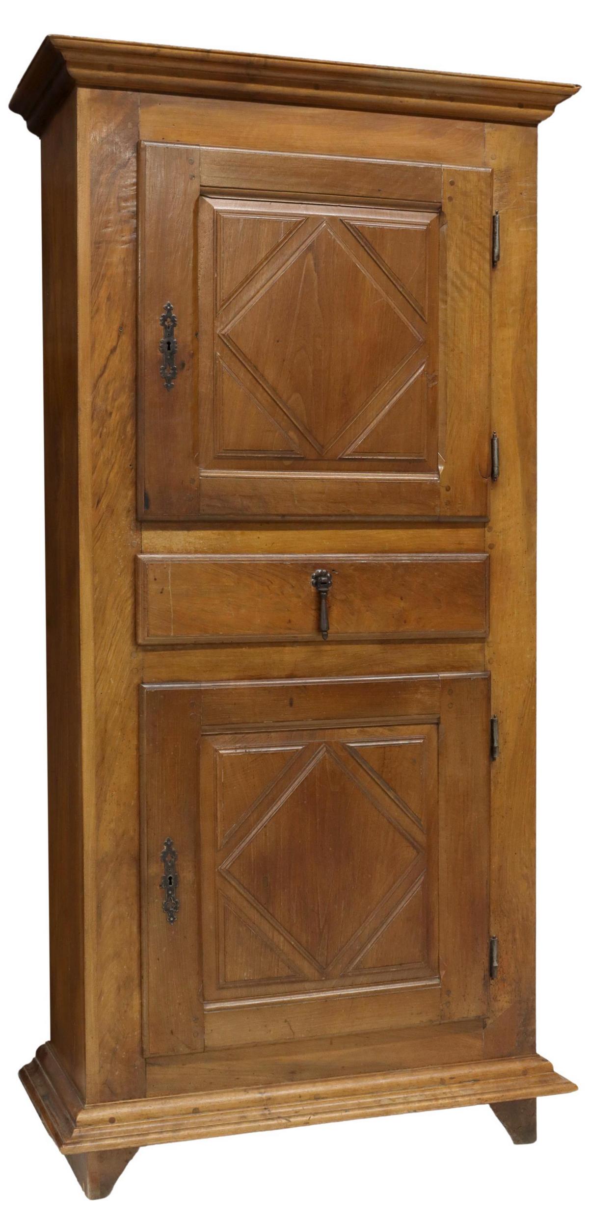FRENCH PROVINCIAL WALNUT HOMME DEBOUT CABINET: French Provincial walnut homme-debout cabinet, early 20th c., molded cornice over two cabinet doors, opening to shelved interior, single middle drawer, rising on bracket feet, having wire holes and pa