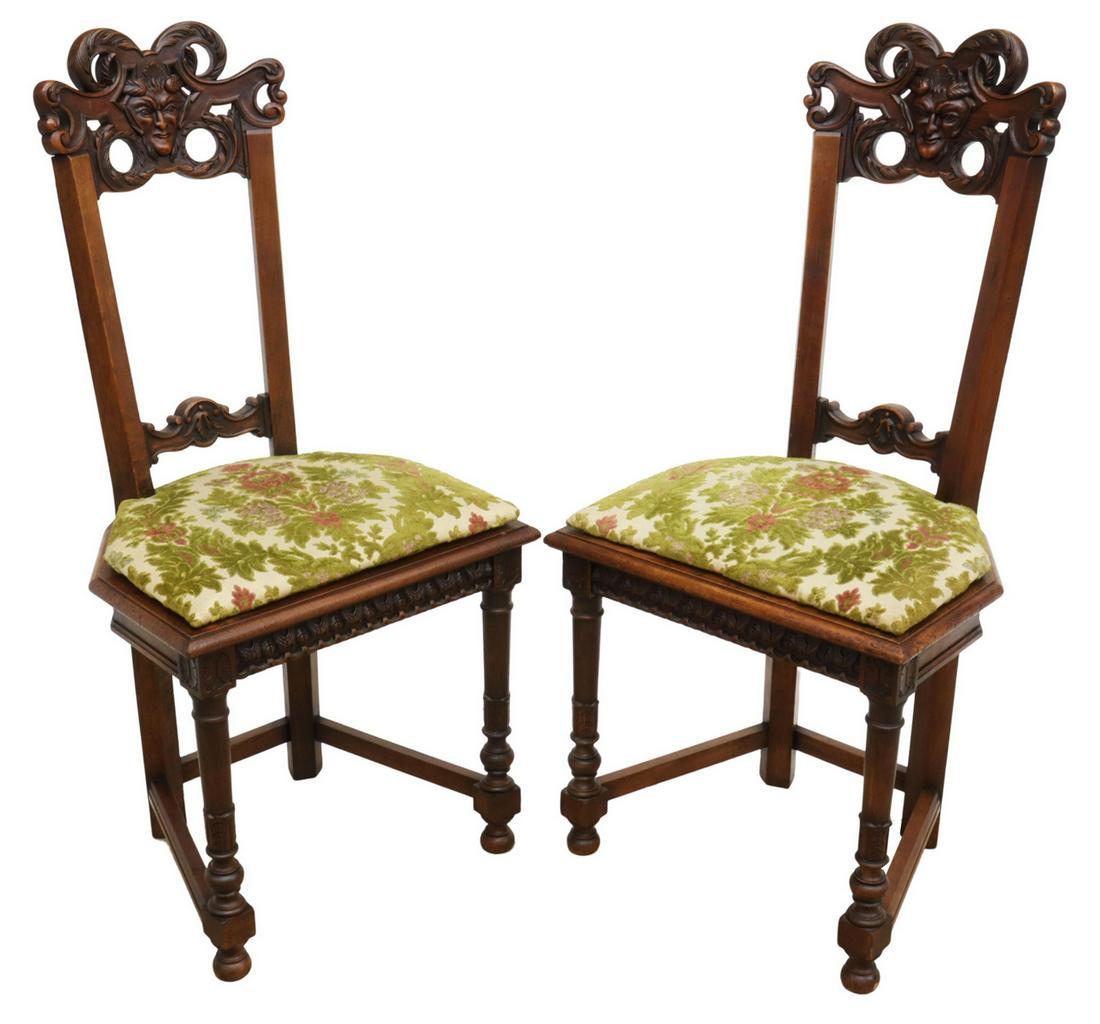 (2) FRENCH RENAISSANCE REVIVAL CARVED HALL CHAIRS: (lot of 2) French Renaissance Revival walnut chairs, late 19th c., carved crest with satyr mask, over cut velvet upholstered seat, molded seat rail, rising on turned front legs, joined by side stretch