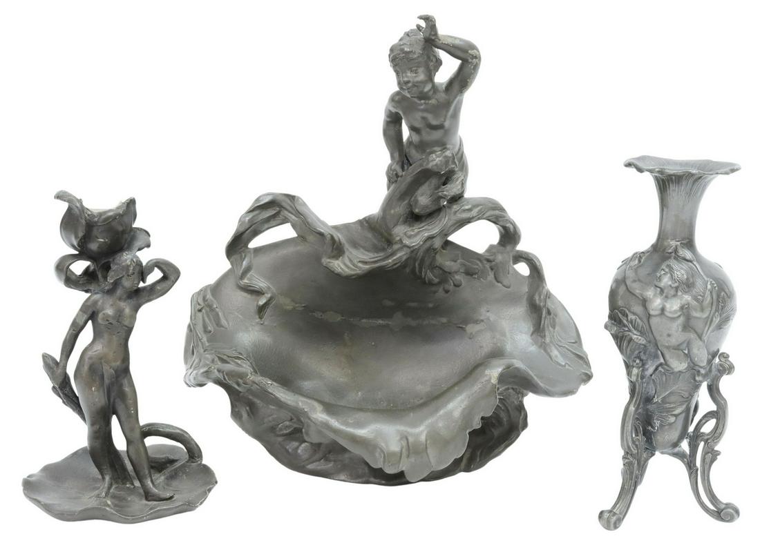 (3) FRENCH DECORATIVE FIGURAL PEWTER ITEMS: (lot of 3) French decorative figural pewter items, comprising: (1) basin, depicting bathing boy, signed in cast Ple Henri, stamped Etain Garanti underfoot, intact with cracks, approx 11"h, 11"w, 7"d; 