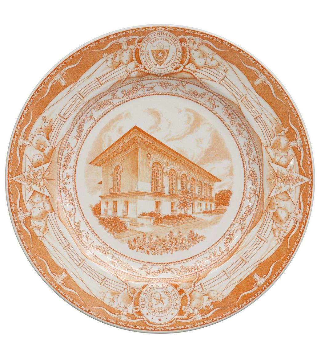 WEDGWOOD UT 'OLD LIBRARY' COMMEMORATIVE PLATE: Wedgwood commemorative University of Texas plate, burnt orange on a white ground, a detailed transfer of the "The Old Library," a rope and bluebonnet design frame the scene with the University of Texa