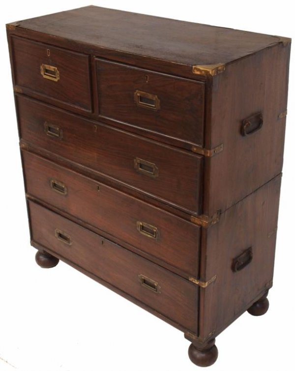 BRITISH COLONIAL ROSEWOOD CAMPAIGN CHEST: British Colonial rosewood two-part campaign chest, 19th c., fitted with two short and three long drawers, each with brass bindings, inset handles, and side carrying handles, raised on stemmed bun feet