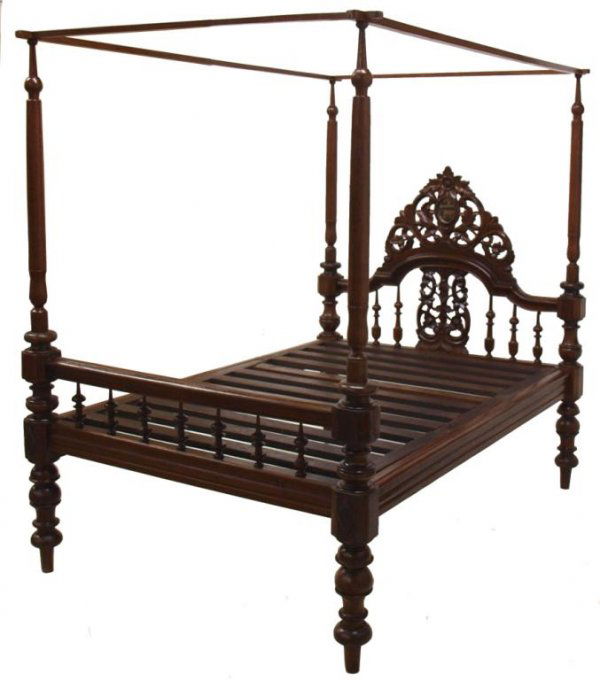 ANTIQUE BRITISH COLONIAL TEAKWOOD POSTER BED: British Colonial teakwood poster bed, mid 19th c., four columnar posts join to canopy supports, the spindled headboard is pierce carved in a foliate motif with mirrored center, foot board with simple
