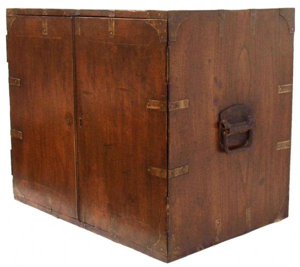 COLONIAL BRASS BOUND ROSEWOOD CAMPAIGN CABINET: British Colonial brass bound rosewood campaign cabinet, 19th c. the rectangular case with side carrying handles, set with a pair of doors opening to varied cubbies and compartments, restored, 20"h, 23