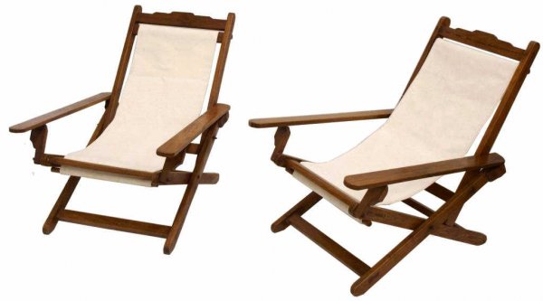 PAIR, ANTIQUE BRITISH COLONIAL CAMPAIGN CHAIRS: (pair) British Colonial campaign chairs, India, early 20th c, teakwood frames with inlay along the top rail, new canvas, open: 29"h, 26"w, 37"d,closed: 31"h 25"w 7"d