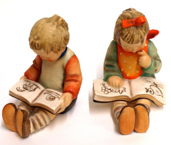 HUMMEL FIGURES: BOOK WORM, BOY & GIRL BOOKENDS: (pair) Hummel figures, "Book Worm", boy and girl bookends, TMK-3SS, weighted with sand, examination under a black light showing only light crazing, 5.5"h, 2lbs total