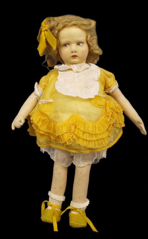 VINTAGE LENCI FELT DOLL FIGURE WITH PAINTED FACE: Vintage Lenci felt doll,her painted brown eyes glancing to the side, original mohair wig retaining felt bow, matching yellow taffeta dress and felt shoes, Lenci mark on the sole of each foot, some spo