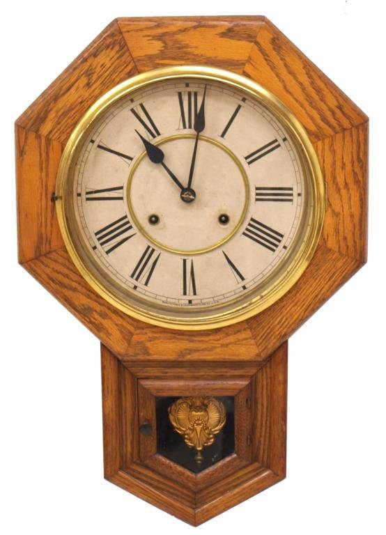 WATERBURY OCTAGONAL OAK CASE WALL CLOCK