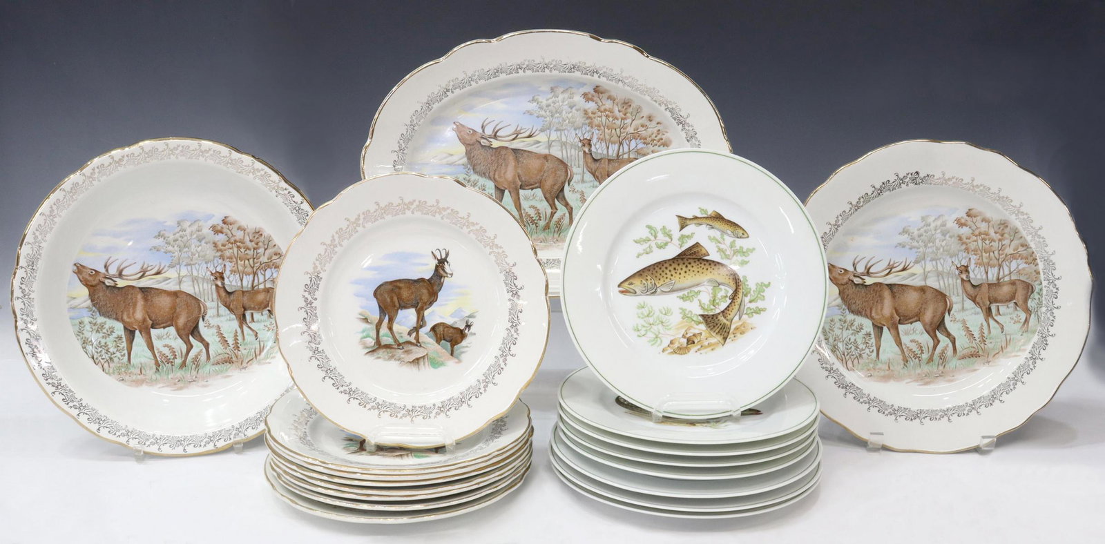 (19) FRENCH PORCELAIN FISH & GAME PLATES: (lot of 19) French porcelain tableware, 20th c., including: (8) fish plates, with (six) unique transferred designs, (five) approx 9 3/8"diam, (three) approx 9.75"diam, (11 piece) game service, Opalor,