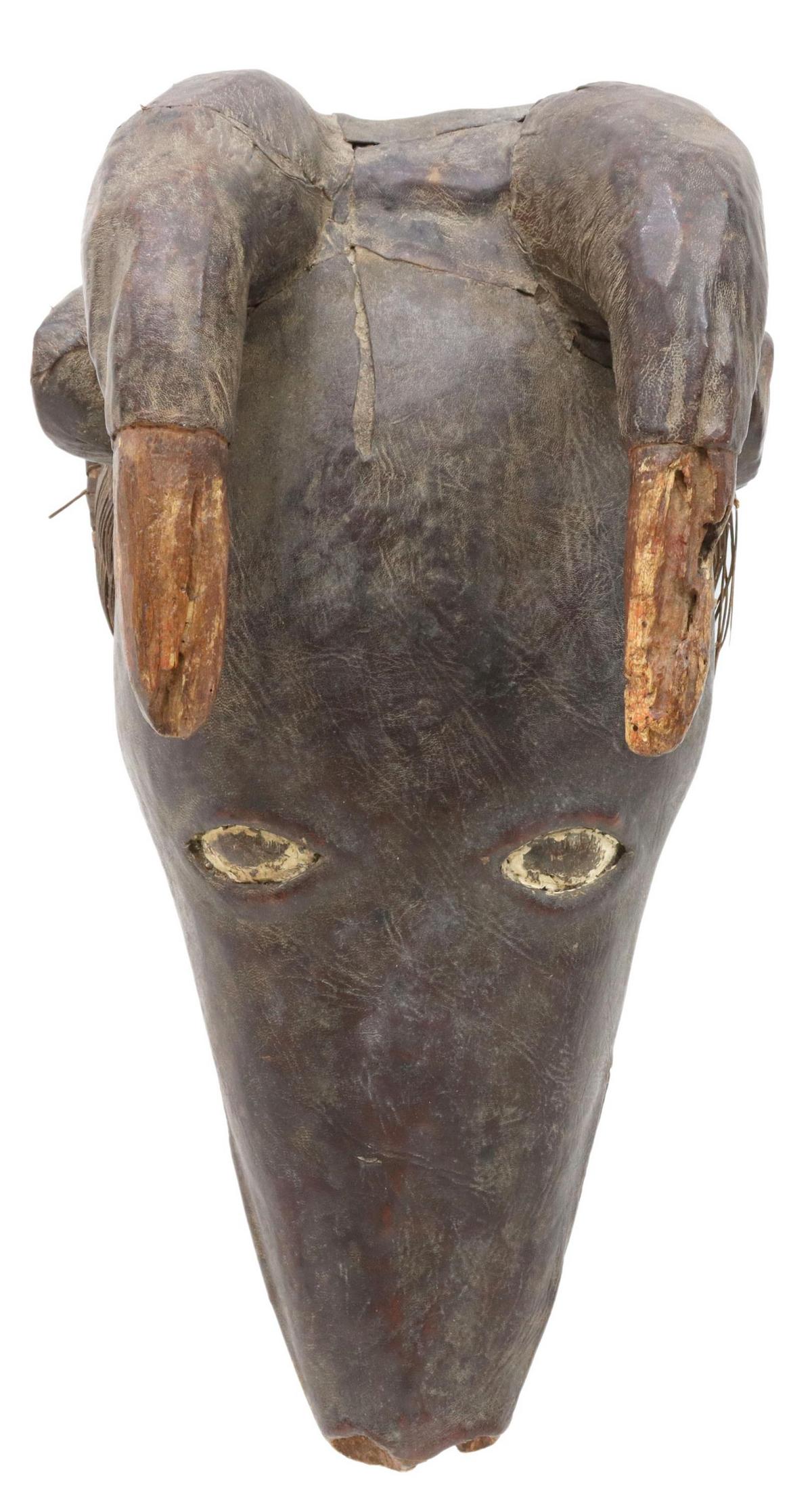 AFRICAN LEATHER & CARVED WOOD ANIMAL HEADDRESS: Large African headdress, possibly Ekoi (Ejagham) peoples, Nigeria, Cameroon, leather clad carved wood animal mask, accented with red and white pigments, having elongated snout with open mouth, visible